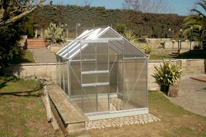Do-it-yourself greenhouse made of wood under a film: personal experience